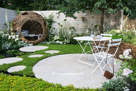 A woven willow bird hide and seating area