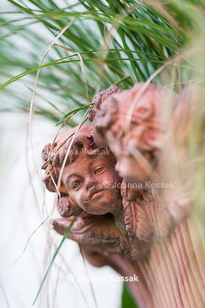 Terracotta planter in the form of an angel child