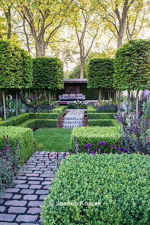 Bluestone cobbles path in centre of formal garden