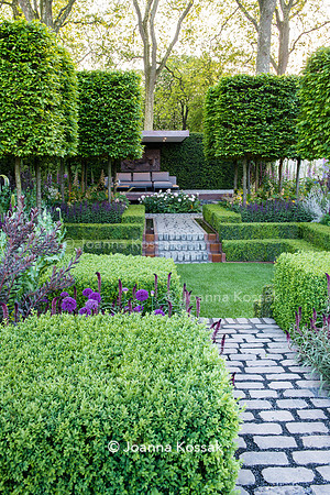 Bluestone cobbles steps and path in centre of formal garden