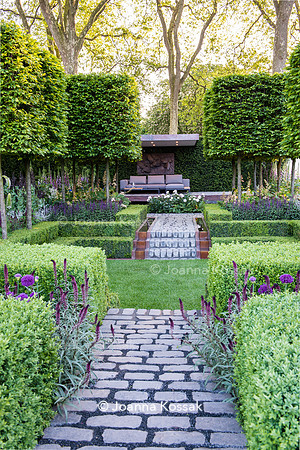 Bluestone cobbles path in centre of formal garden