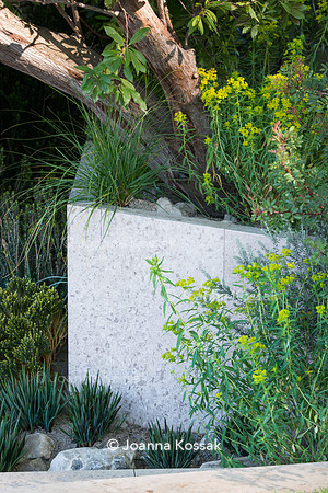 Raised bed built with stone panels